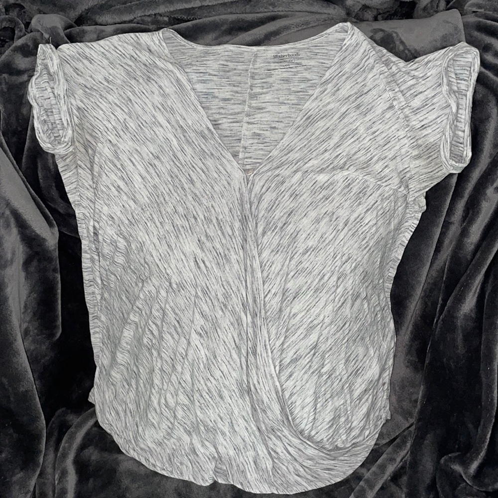 Gray scooping with button nursing top.
